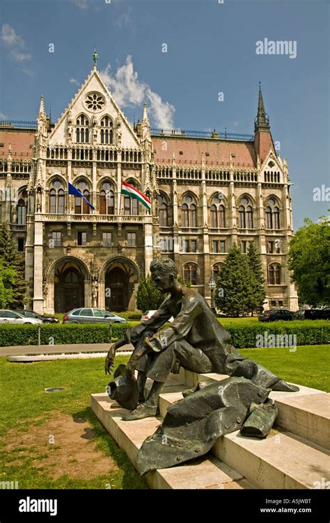 Statue Of Josef Attila In Front Of The Parlament Building In Neogothic