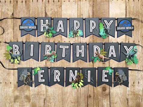 A Happy Birthday Banner Is Hanging On A Wooden Wall With The Wordshappy Birthday Bernie