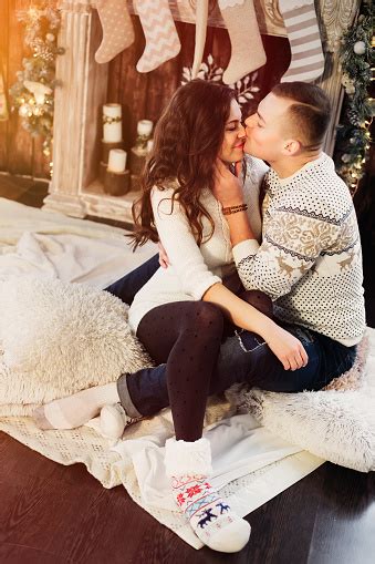 Nice Love Couple Sitting On Carpet In Front Of Fireplace Woman Stock