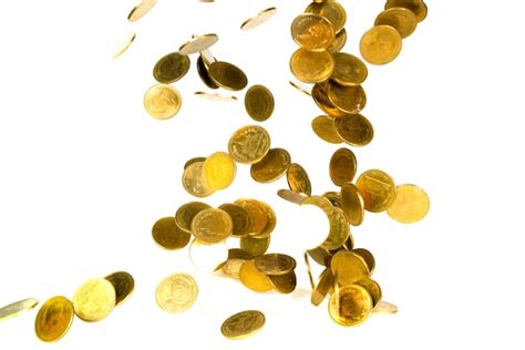 Premium Photo Movement Of Falling Gold Coin Isolated On White