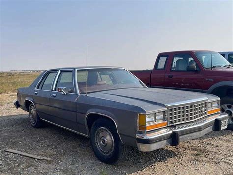 1984 Ford Crown Victoria 4 Dr Car Wild Rose Auction Services