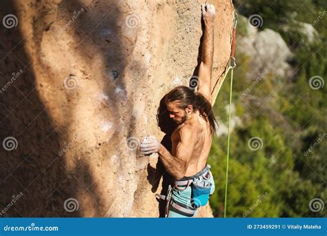 Rock Climbing Moments Strong Man Trying Hard To Grip Handholds On