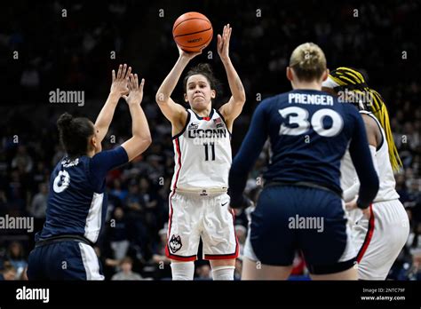 Uconn S Lou Lopez Senechal Shoots Over Xavier S Shelby Calhoun