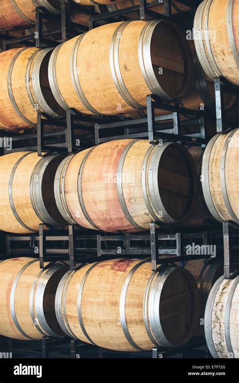 Wine barrels aging Stock Photo - Alamy