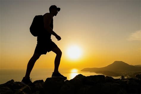 Premium Photo Stunning Mountain Landscape The Silhouette Of A Man