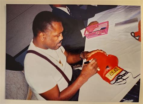 Joe Frazier Autographed Boxing Glove Smokin Joe Frazier Exact Photo