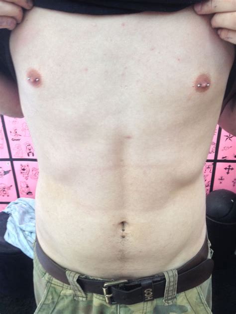 Nipples With Bars And Lower Navel Piercin In Male Piercings