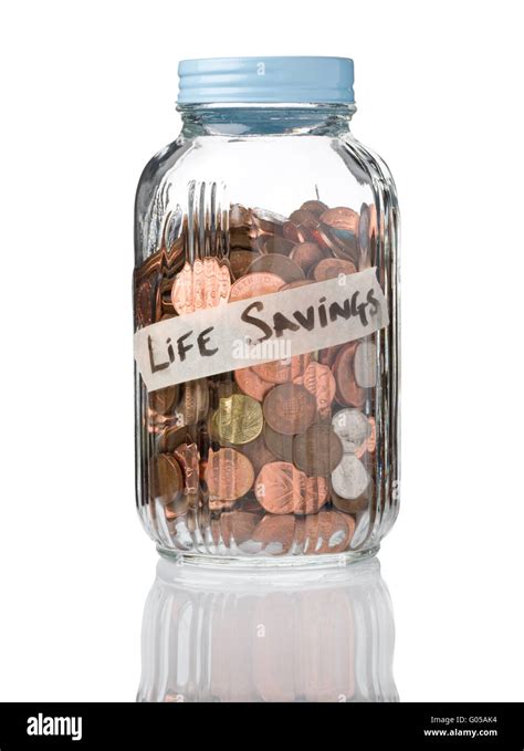 Life Savings Written On A Glass Jar That Is Used For Saving Money Stock