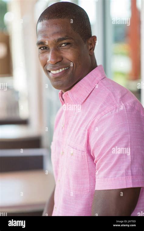 Portrait of smiling Black man Stock Photo - Alamy