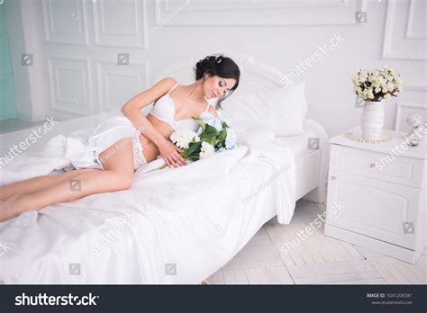 Sexy Woman Lingerie Lying Bed Flowers Stock Photo Shutterstock