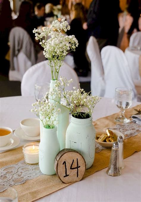 30 Incredible Milk Bottle Centerpieces For Your Wedding Party Mint Wedding Centerpieces