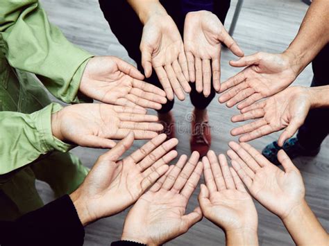 Diverse Hands Circle Symbolizing Team Inclusivity And Cooperation Unity