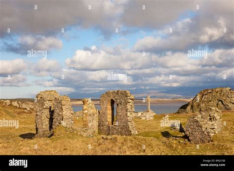 Historic 16th Century Ruins Of St Dwynwen S Church With Celtic Cross On