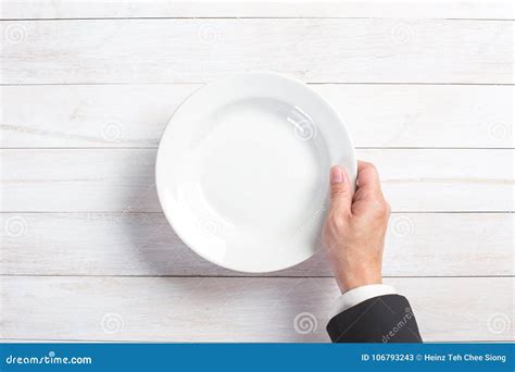 Man S Hand Holding A White Empty Plate Stock Image Image Of Cuisine