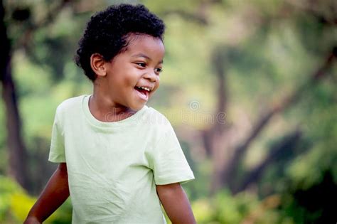 Portrait of a Beautiful Laughing Boy Stock Photo - Image of close ...