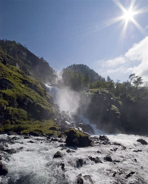 Waterfall and sun stock photo. Image of beautiful, mountains - 3486824