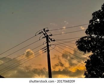 Silhouette Power Pole Power Lines Sunset Stock Photo 2017068209 ...