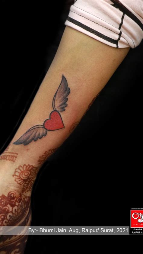 AWESOME ANGEL WINGS WITH HEART TATTOO DESIGN | Heart tattoo, Heart ...