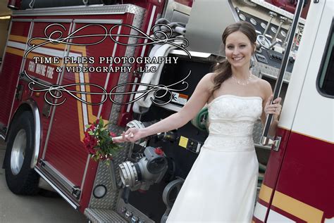 Bride Hanging Off The Side Of The Fire Truck Photography And