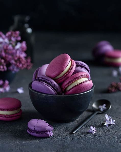 Pink and Purple Macarons in a Black Bowl