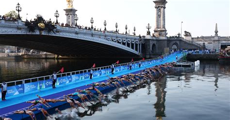 Olympic Triathletes Test Swimming In The Seine Reuters