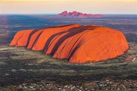 Prints of Uluru and Kata Tjuta at sunrise, Aerial view. Northern ...