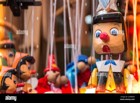 Wooden Pinocchio Dolls With Long Nose Conceptual Fairy Tale Character