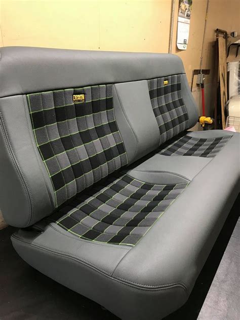 Gray and Black Seat Covers with Green Stitching