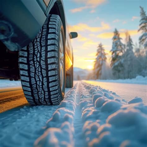 Premium Photo Icy Grip Winter Tire On A Snowy Road Enhancing Driving