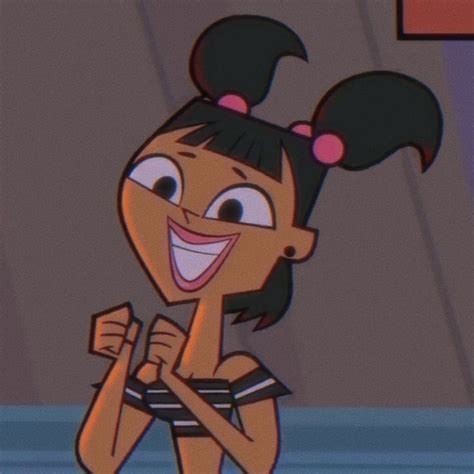 A Cartoon Girl With Black Hair And Pink Ears Smiling At The Camera