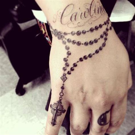 Rosary Tattoo Located On The Wrist And Hand