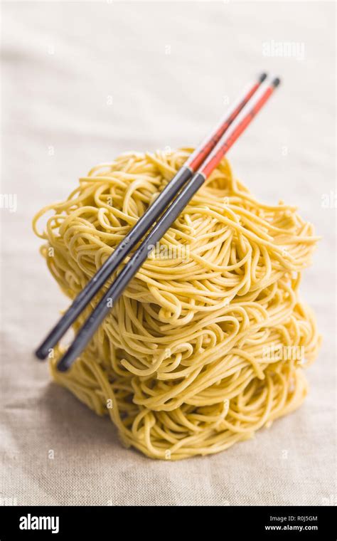 Uncooked Instant Chinese Noodles And Chopsticks Stock Photo Alamy