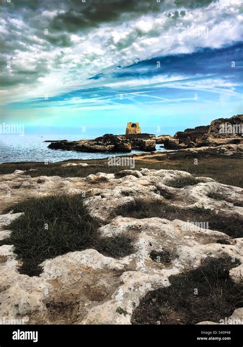 The Tower Of Roca Vecchia And The Rocky Coast Of Salento In Italy Stock