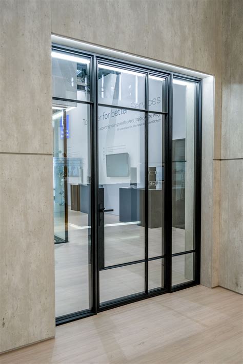 SLIM LINE 38 ULTRA SLIM Aluminum hinged door with double glass By