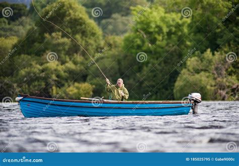 Man Fishing On The Lakes Of Killarney National Park Editorial Image