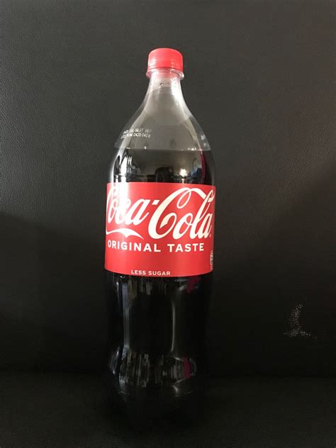 Coca Cola Original Taste Less Sugar L Food Drinks Beverages