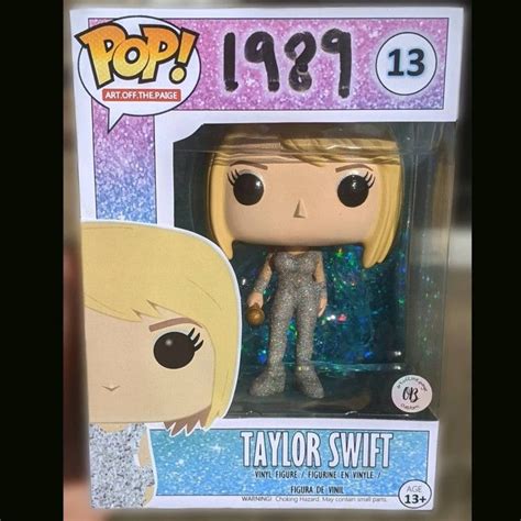 A Pop Vinyl Figure In A Box With An Image Of Taylor Swift On The Front