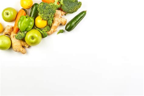 organic vegetables  fruits frame  green background  copy space