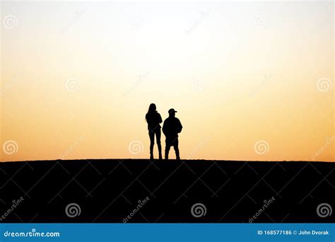 Two People Stand Together Side By Side Stock Photo Image Of