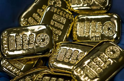 Gold Retreats As Traders Book Profits From Rally To Fresh Record