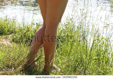 Naked Female Legs On Grass Near Stock Photo 1429805105 Shutterstock