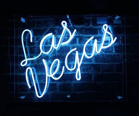 Neon Signs Las Vegas White Neon Sign Hung On The Brick Background ...