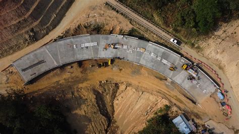 Aerial view of development of new road construction or overpass under ...