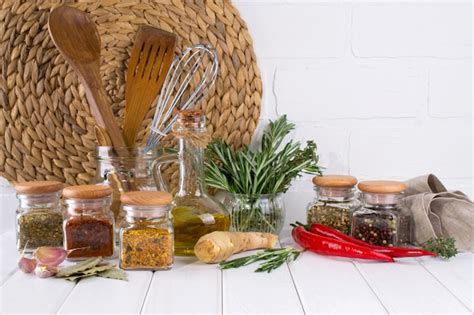 Premium Photo Kitchen Utensils Herbs Colorful Dry Spices In Glass