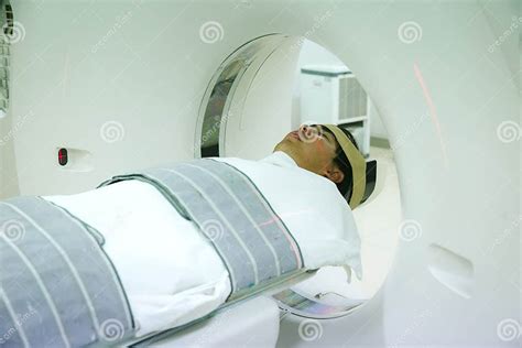 Patients Screening On Ct Scanner Man Undergoing Ct Scan While Doctor`s