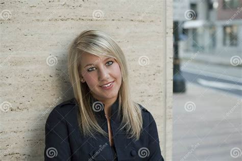 Woman Leaning Against Wall Stock Image Image Of Outdoors 12991999