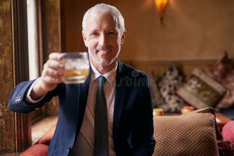 Raise A Glass With Me Portrait Of A Well Dressed Mature Man Making