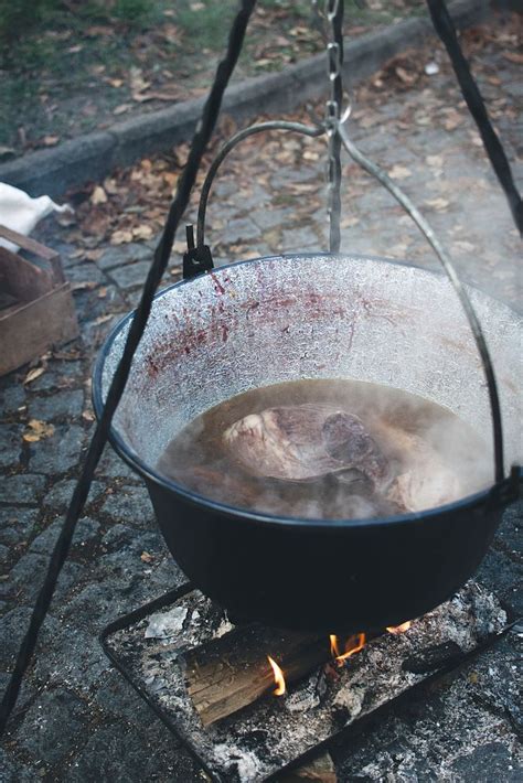 Cooking in a kettle | Free Photo - rawpixel