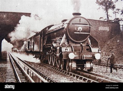 steam train stops for water, England 1930 Stock Photo - Alamy