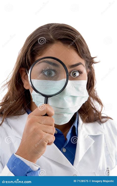 Female Doctor Inspecting With Magnifying Glass Stock Image Image Of Hospital Indoors 7128575